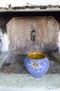 Bowl with porridge on village stove