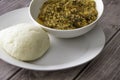 Bowl of Pounded Yam served with Egusi - Melon Soup