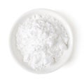 Bowl of powder sugar on white background, top view