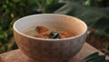 A bowl of pumpkin and banana soup