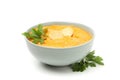 Bowl of pumpkin soup with croutons and parsley isolated on white Royalty Free Stock Photo