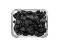 Bowl with raisins on white background, top view. Royalty Free Stock Photo