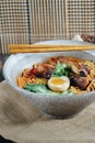 A bowl of ramen with meat and egg in it Royalty Free Stock Photo
