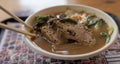 A bowl of ramen from a restaurant on a tray. Japanese ramen soup with pork, egg and chives Royalty Free Stock Photo