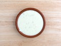 Bowl of ranch dressing on a wood table top view Royalty Free Stock Photo