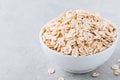 Bowl with raw oatmeal oat flakes Royalty Free Stock Photo