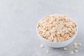 Bowl with raw oatmeal oat flakes Royalty Free Stock Photo