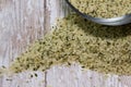 Bowl of Raw Shelled Hemp Seeds on a Wood Plank Board Royalty Free Stock Photo