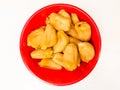 A bowl of ready-to-eat jackfruit on a white background. Sweet taste and chewy texture.