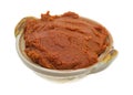 Bowl of red curry paste on a white background Royalty Free Stock Photo