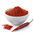 Bowl with red pepper powder isolated from white background Royalty Free Stock Photo