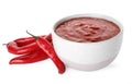 Bowl with red sauce and fresh chili peppers isolated Royalty Free Stock Photo