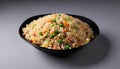 A bowl of rice with peas and carrots