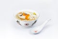 Bowl rice porridge with spoon