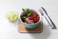 Bowl with roast beef, vegetables, spices and cherry tomatoes. Royalty Free Stock Photo