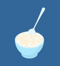 Bowl of round rice porridge and spoon isolated. Healthy food for