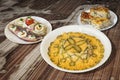 Bowl Of Russian Salad With Bacon Egg And Cheese Sandwich And Spinach Cheese Pie Zeljanica Set On Old Flaky Wooden Garden Table