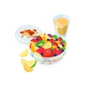 Bowl of salad made of fresh exotic fruits, glass of orange juice and nuts lying on plate isolated on white background