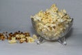 Bowl of salted popcorn on an old table. Selective focus Royalty Free Stock Photo