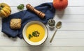 Bowl with seasonal pumpkin cream soup. Vegan recipe