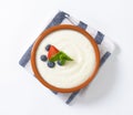 Bowl of semolina pudding with fruit