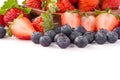 A bowl set of beautiful and delicious strawberry and blueberry isolated on white background, close up, copy space, clipping path, Royalty Free Stock Photo