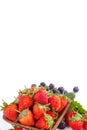 A bowl set of beautiful and delicious strawberry and blueberry isolated on white background, close up, copy space, clipping path, Royalty Free Stock Photo