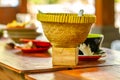 A bowl-shaped rice holder with a box tool made of woven bamboo Royalty Free Stock Photo