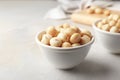 Bowl with shelled organic Macadamia nuts Royalty Free Stock Photo