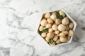 Bowl with shelled organic Macadamia nuts Royalty Free Stock Photo