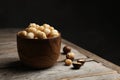 Bowl with shelled organic Macadamia nuts Royalty Free Stock Photo