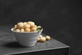 Bowl with shelled organic Macadamia nuts Royalty Free Stock Photo