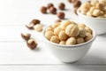 Bowl with shelled organic Macadamia nuts Royalty Free Stock Photo