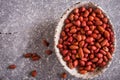 Bowl of shelled peanuts above Royalty Free Stock Photo