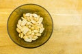 Bowl with shelled peanuts. View from above. Royalty Free Stock Photo