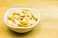 Bowl with shelled peanuts. Royalty Free Stock Photo