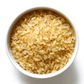 Bowl of short grain parboiled rice on white. Royalty Free Stock Photo