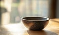 A bowl is sitting on a table Royalty Free Stock Photo