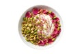 Bowl Smooth Pink Base, Raspberry Swirl, Rose Petals, Pistachio Crumbles On White Plate On A White Background