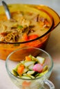 A bowl of Soto Betawi, Indonesian native traditional soup made of beef or beef offal cooked in coconut milk broth with pickles