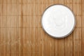 Bowl with sour cream on the table, top view Royalty Free Stock Photo