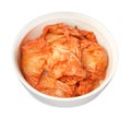 Bowl of spicy cabbage kimchi isolated on white