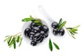 Bowl and spoon with black olives on white background Royalty Free Stock Photo