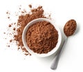 Bowl and spoon of cocoa powder isolated on white background Royalty Free Stock Photo