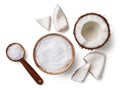 Bowl and spoon of coconut oil and fresh coconut pieces Royalty Free Stock Photo