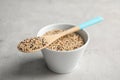 Bowl and spoon with mixed quinoa seeds Royalty Free Stock Photo