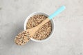 Bowl and spoon with mixed quinoa seeds Royalty Free Stock Photo