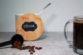 A bowl with stevia sweetener and a glass of black coffee, grey background Royalty Free Stock Photo