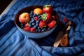 a bowl of strawberries and blueberries on a blue Royalty Free Stock Photo