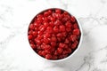 Bowl of sweet cherries on marble background, top view Royalty Free Stock Photo